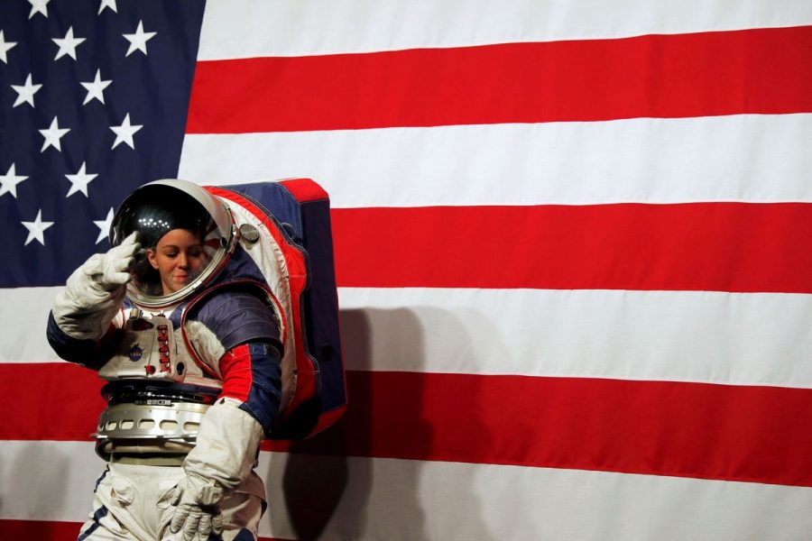 Advanced Space Suit Engineer at NASA Kristine Davis wears the xEMU prototype space suit for the next astronaut to the moon by 2024, during its presentation at NASA headquarters in Washington, U.S., October 15, 2019. REUTERS/Carlos Jasso TPX IMAGES OF THE DAY