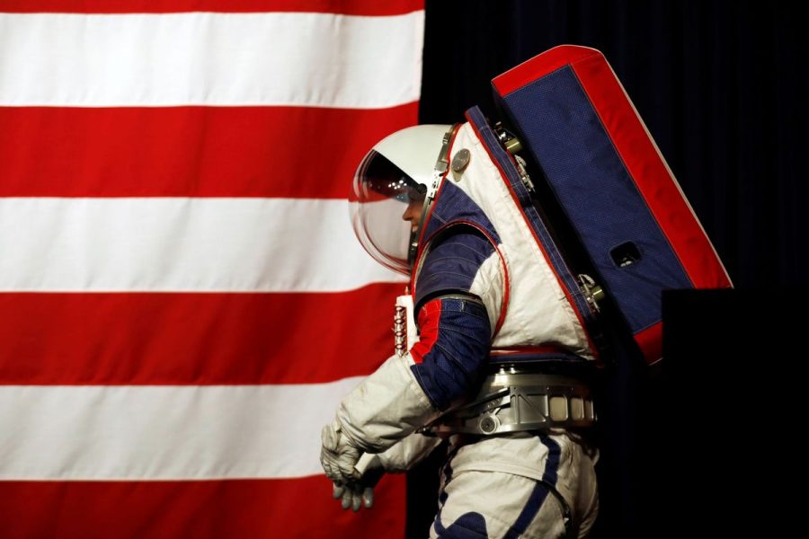 Advanced Space Suit Engineer at NASA Kristine Davis wears the xEMU prototype space suit for the next astronaut to the moon by 2024, during its presentation at NASA headquarters in Washington, U.S., October 15, 2019. REUTERS/Carlos Jasso